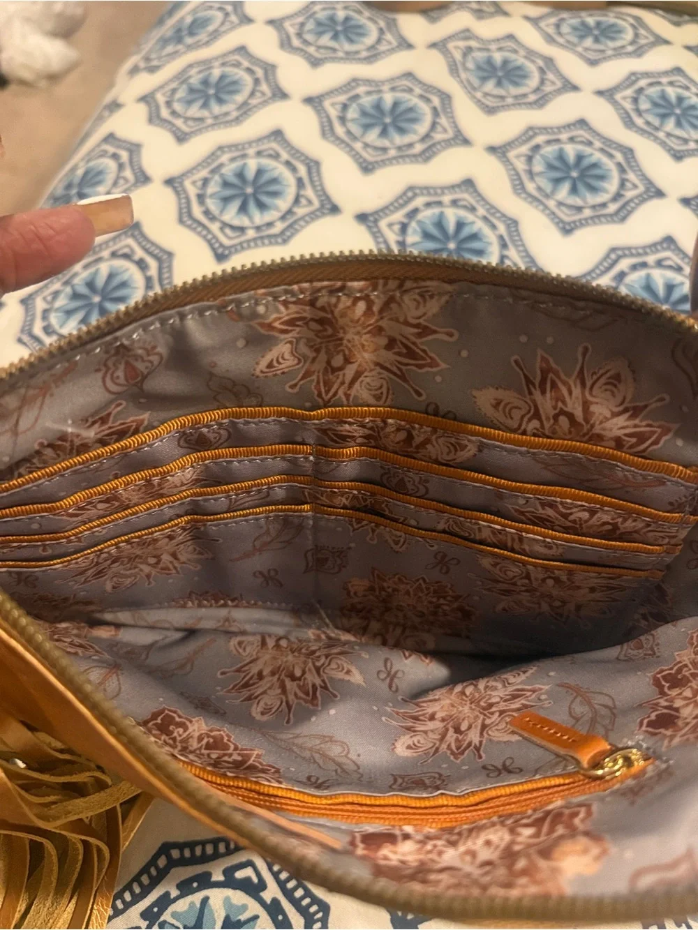 HOBO Metallic Gold Leather Wristlet with Tassel and Ring Handle